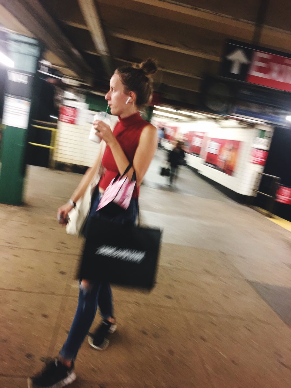 motion, blurred motion, speed, lifestyles, full length, real people, one person, running, transportation, on the move, leisure activity, mode of transportation, women, casual clothing, incidental people, city, sport, land vehicle, architecture