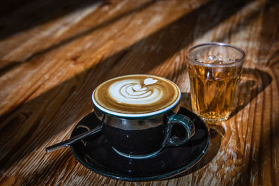 Close-up of coffee cup on table