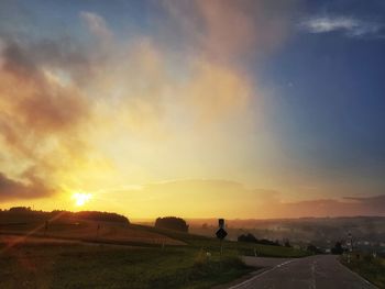 Road against sky during sunset