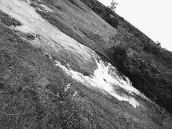 Scenic view of waterfall against clear sky