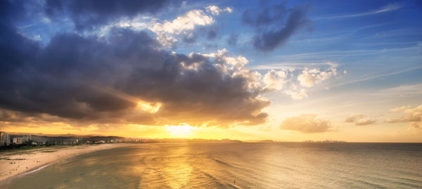 Scenic view of sea against cloudy sky