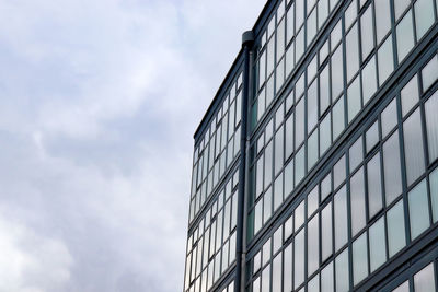 Low angle view of modern building against sky