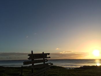 Scenic view of sea at sunset