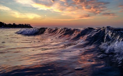 Scenic view of sea against dramatic sky