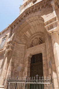 Low angle view of historical building against sky