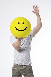 Man wearing mask against white background