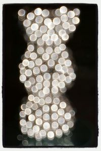 Close-up of glass over black background