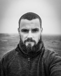 Portrait of man against sea