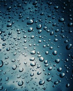 Close-up of water drops on glass