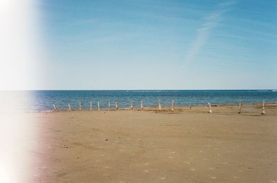 Scenic view of calm sea against sky