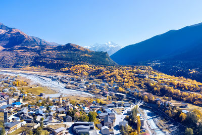 High angle view of snowcapped mountain against sky