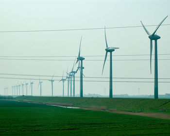 Wind turbines on field