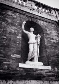 Low angle view of buddha statue