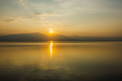 Beautiful sunset at the big lake at phayao or kwan phayao thailand
