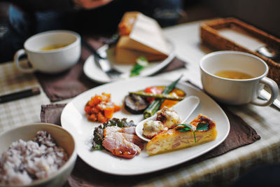 Close-up of breakfast served on table