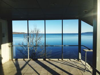 Scenic view of sea seen through window