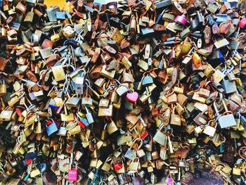 Close-up of padlocks on railing