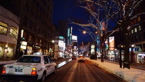 Traffic on city street at night