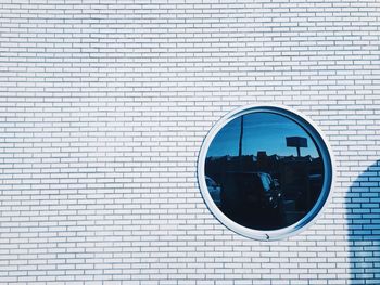 Reflection of building on glass window