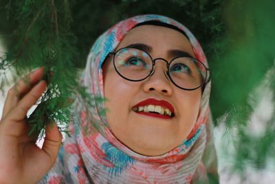 Close-up of young woman with eyeglasses