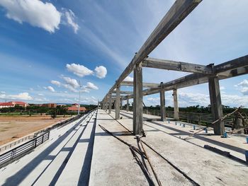 Bridge over road against sky