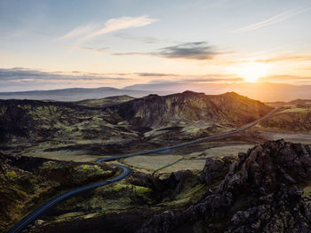 Scenic view of landscape against sky during sunset