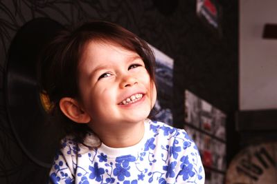 Portrait of smiling girl at home