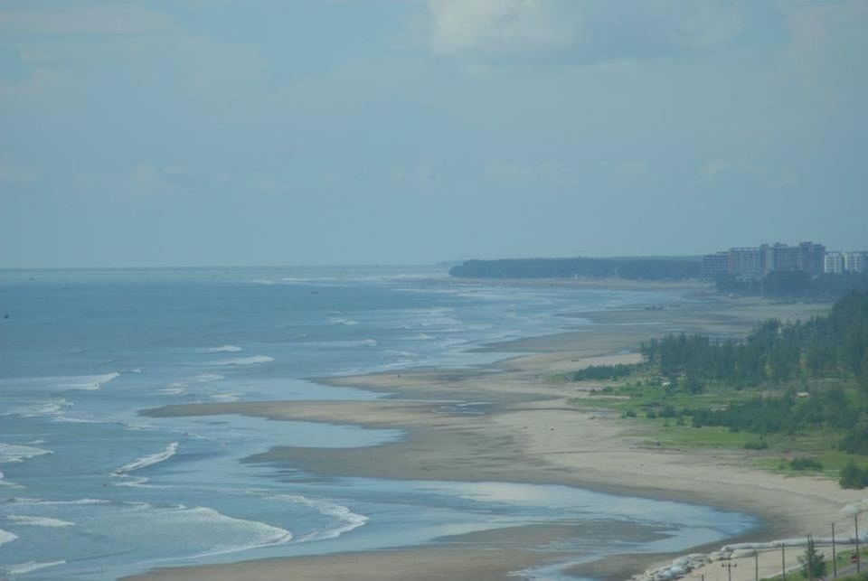 water, sea, beach, scenics, tranquility, tranquil scene, shore, beauty in nature, sky, horizon over water, sand, nature, coastline, idyllic, day, high angle view, outdoors, blue, remote, sunlight