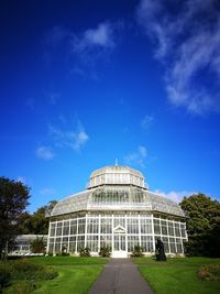 Footpath leading towards greenhouse