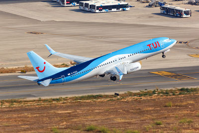 High angle view of airplane on airport runway