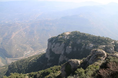 High angle view of rocks and mountains against sky