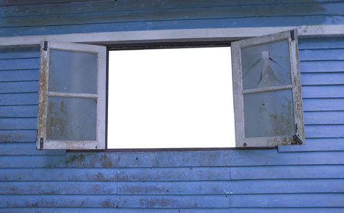 Low angle view of window on old building