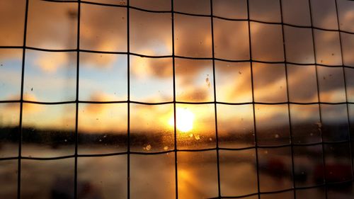 Full frame shot of window against sky during sunset