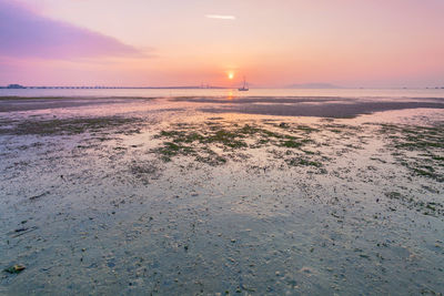 View of beach at sunset