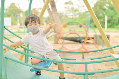 Boy playing in playground