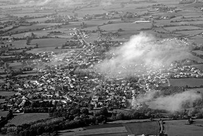 Aerial view of city against sky