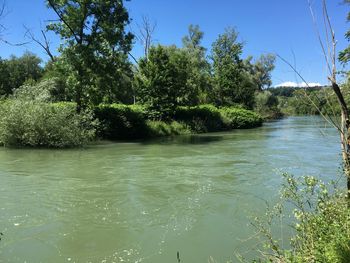 Scenic view of river against sky