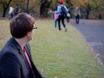 Rear view of man in park