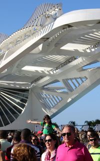 Low angle view of people in amusement park