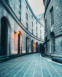 Digital composite image of street and buildings at night