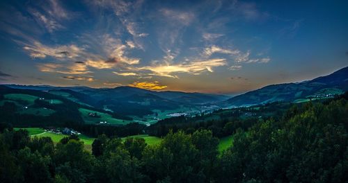 Scenic view of mountains against sky during sunset