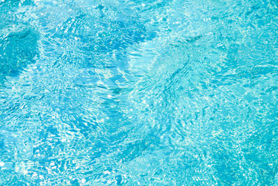 Full frame shot of blue water in swimming pool