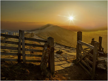 Scenic view of landscape against sky during sunset