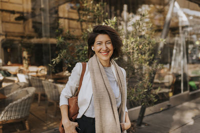 Smiling woman looking at camera