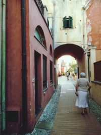 View of people walking in front of building