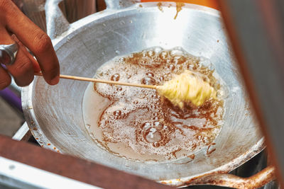 High angle view of person preparing food in kitchen