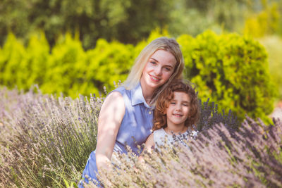 Portrait of smiling girl with plants