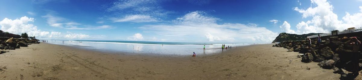 Panoramic view of beach against sky