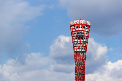 Low angle view of tower against cloudy sky