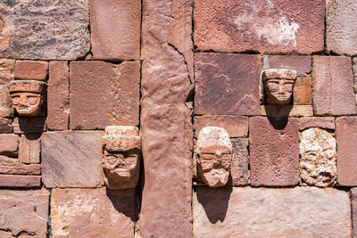 Carvings on old wall at tiwanaku